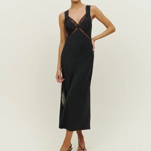 Reformation Provence Dress. Its a size too small .I gained weight